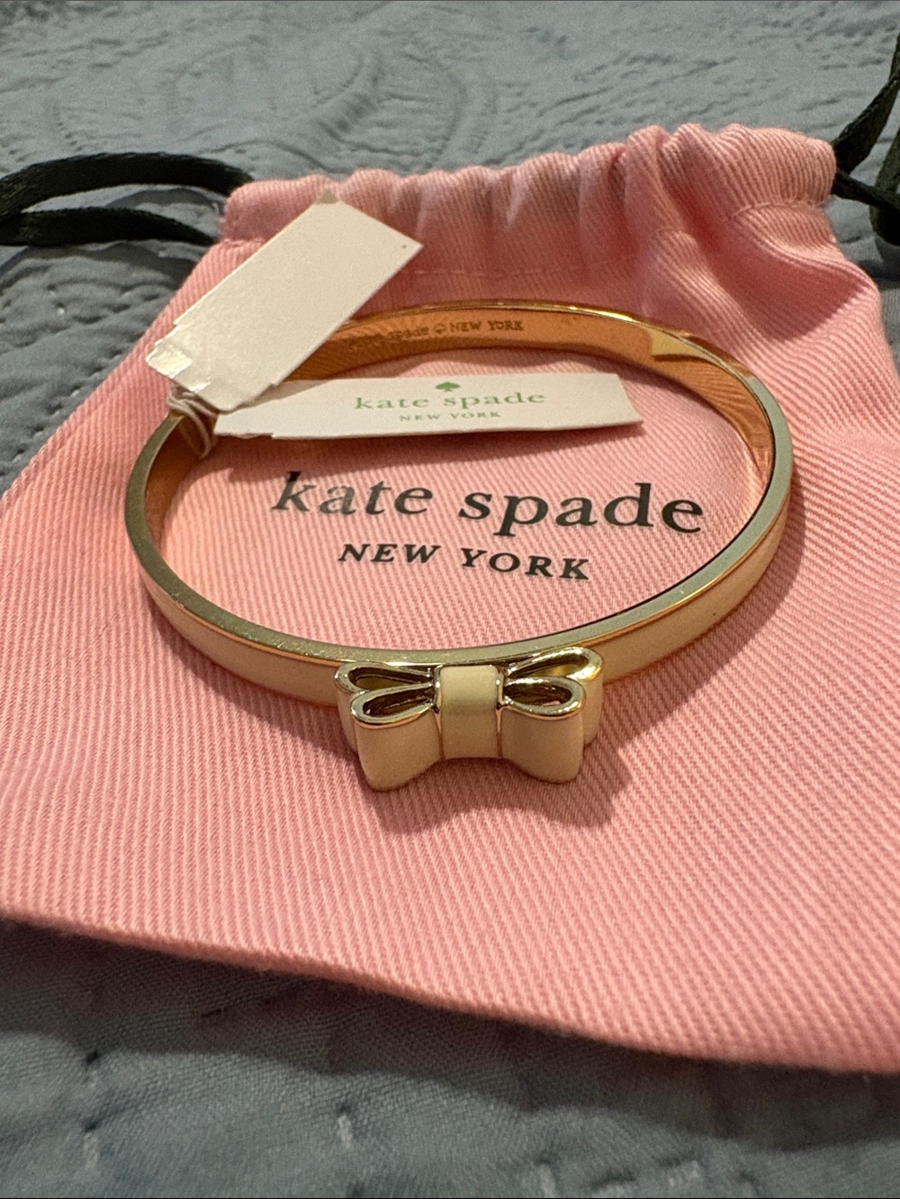 kate spade Cream and Gold Bow Bangle Bracelet